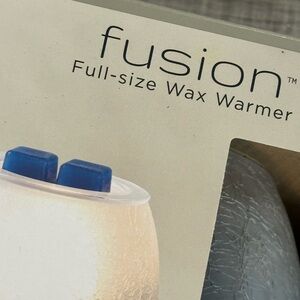 Wax warmer and melts. Brand new in box.